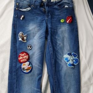 I'm selling ankle jeans with patches!